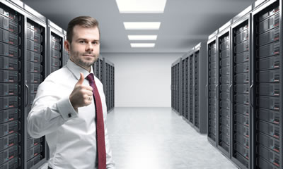 Man with Thumb Up in Server Room